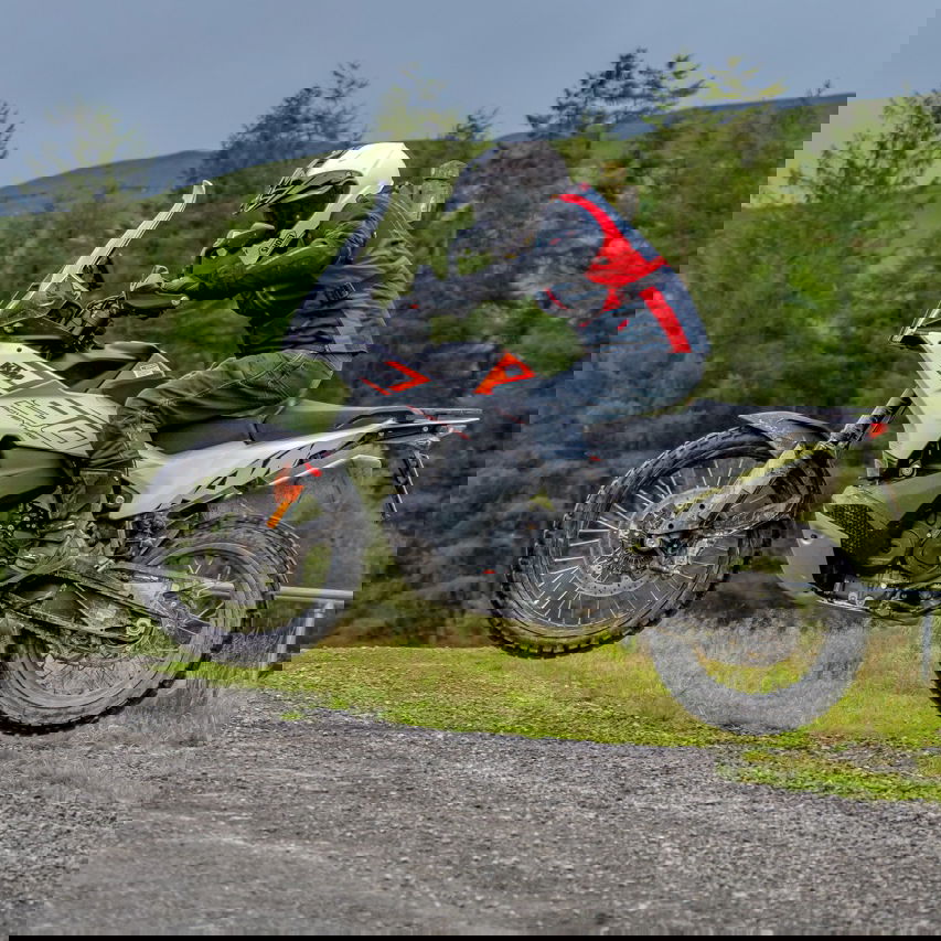 A 790 Adventure motorcycle jumping through the air